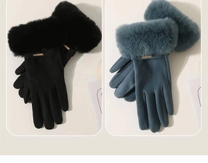 Detailed close-up of winter thermal gloves with plush faux fur trim and gold metal buckle