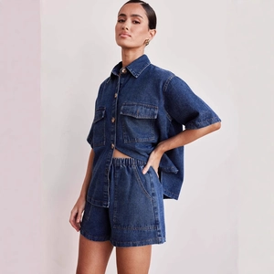 Women's two-piece dark blue denim set with short sleeve shirt and elastic waist shorts