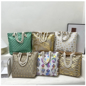Selection of linen tote bags with nautical patterns and durable hemp rope handles