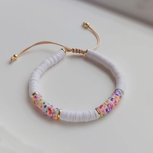 Handmade Heishi clay bead bracelet with colorful stripes and adjustable braided cord