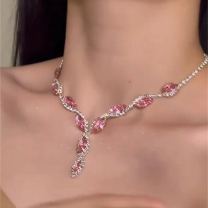 Pink marquise cut gemstone necklace set with sparkling silver finish on female model