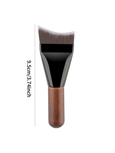 Detail of 9.5cm ultra-thin crescent foundation brush with curved bristles and wood handle