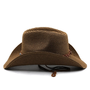 Detail of dark brown straw cowboy hat with turquoise beads and leather decorative band