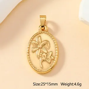 Detailed golden oval pendant with lily floral relief, size 25x15mm and weight 4.6g