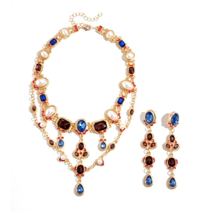 Vintage palace style jewelry set with blue gems, pearls, and multi-layer necklace