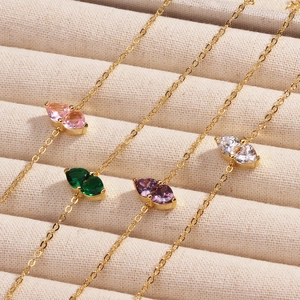 Double heart birthstone bracelets in pink green purple and white stones on gold chain