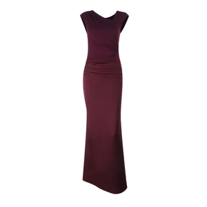 Detail of burgundy sleeveless evening gown featuring pleated waist and crossover neckline