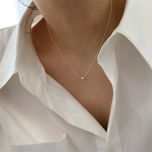 Minimalist 925 sterling silver geometric square pendant necklace worn by a woman
