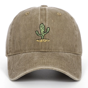 Detailed embroidery of a green cactus on a vintage washed cotton baseball cap