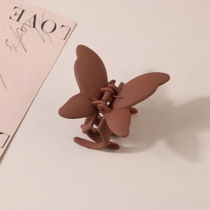 Matte mocha butterfly hair claw clip made of durable ABS plastic in elegant wing shape
