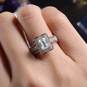 Luxurious emerald-cut zircon ring with micro-pave setting on polished silver band