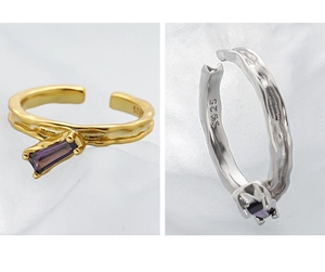 Detail of S925 sterling silver open rings with irregular texture and purple zircon stones