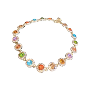 Luxurious gold collar necklace featuring colorful round gemstones and halo crystals