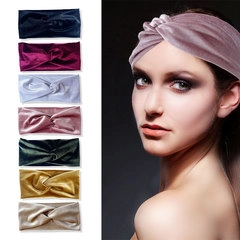 Multiple colors of velvet headbands shown with a model wearing the pink lace style