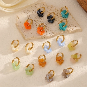 Colorful glass flower earrings with gold stainless steel hoops in various vibrant colors