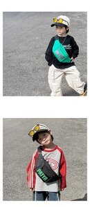 Detail of neon green and black nylon chest bags for kids with bold letter printing