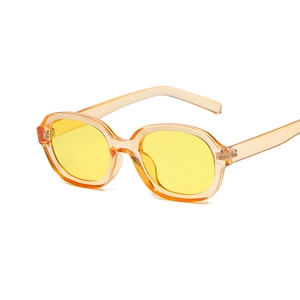 Oval concave sunglasses with yellow transparent lenses and champagne resin frame for fashion