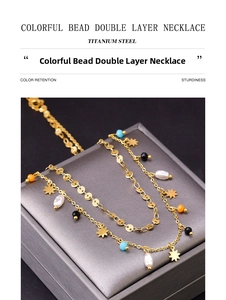 Close-up of double-layer titanium steel necklace with star pendant and colorful beads