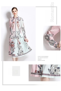 Detail of elegant pleated floral dress showing vintage prints and cuffed long sleeves