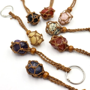 Handmade woven net keychains with natural stones like amethyst and rose quartz