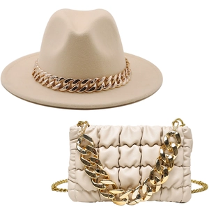 Matching beige wool fedora and quilted handbag set with elegant gold chain accents