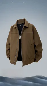 Detail of a brown lightweight windproof jacket featuring a stand collar and full zipper