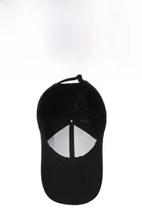 Detail view of the breathable mesh interior and adjustable strap of a black sports cap