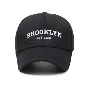 Black cotton baseball cap with white Brooklyn EST 1631 embroidery on front side