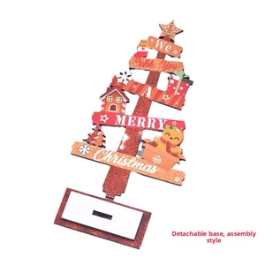 Detail of red wooden Christmas tree desk ornament with detachable base and holiday prints