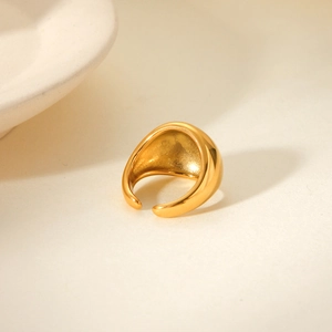 Detailed shot of gold-plated chunky ring featuring mirror polish and frosted inner surface