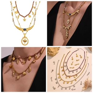 Detailed view of marine themed necklaces featuring seahorse, turtle and shell pendants