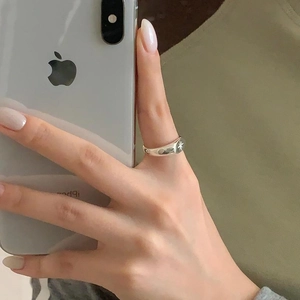Mirror selfie showing a minimalist 925 silver ring with an engraved eight-pointed star