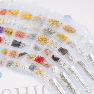 Various creative nail art metal chains including pearl and rhinestone styles in multiple colors