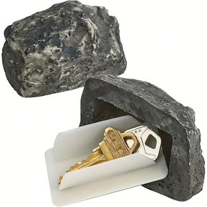 Macro detail of fake rock key hideout showing the realistic stone texture and bottom cover