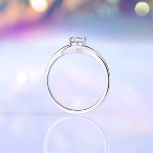 Artistic eye-shaped 0.5ct moissanite four-prong 925 silver ring with twisted band