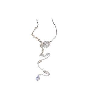 Elegant silver Y-shaped necklace with diamond flower motif and teardrop tassel pendant