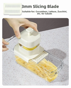 Detail of 3mm stainless steel shredding blade and food container for vegetable slicer