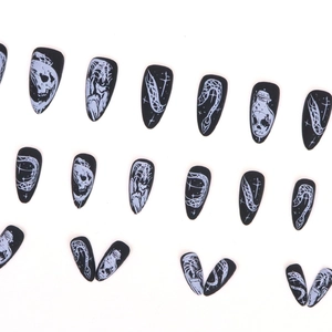 Halloween matte black press-on nails with skull snake and gothic cross patterns