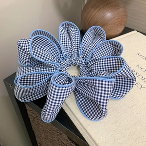 Blue and white gingham checkered scrunchie with lace petal edges for ponytail hairstyles