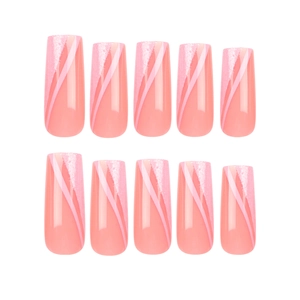 Pink gradient long coffin press-on nails with glitter accents and diagonal stripes
