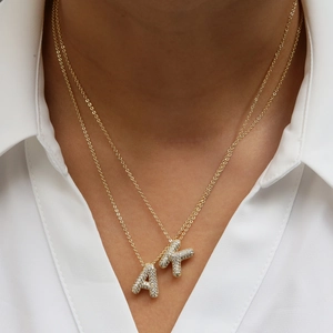Layered 18k gold plated brass necklace with zircon paved A and K letter pendants
