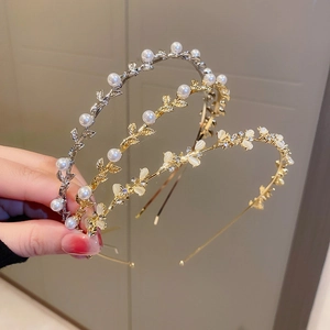 Three-piece hairband set with floral pearls, rhinestones, and leaf designs in gold and silver