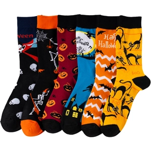 Set of 6 Halloween crew socks featuring pumpkins bats and ghost motifs on plain background