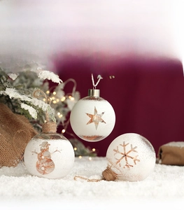 Set of 3 clear Christmas baubles with snowman and star patterns on festive tree branches