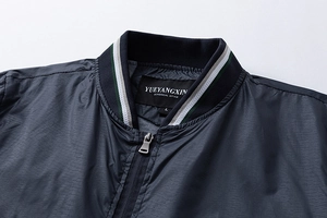 Detail of ribbed collar with contrast stripes on a casual summer jacket for men