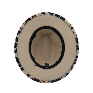 Wide brim fedora hat with beige top and cow print pattern underbrim for men and women