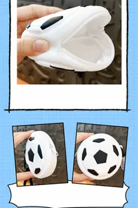 Detailed macro view showing the interior and exterior of a football-shaped mini coin purse.