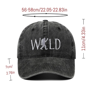 Detail of washed black baseball cap with WILD embroidery and 56-58cm size measurements
