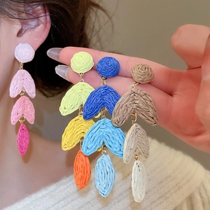 Bohemian colorful layered raffia tassel earrings with vibrant multi-color woven design