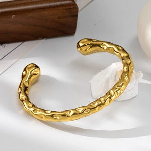 18K gold plated C-shaped stainless steel cuff bracelet with irregular hammered texture